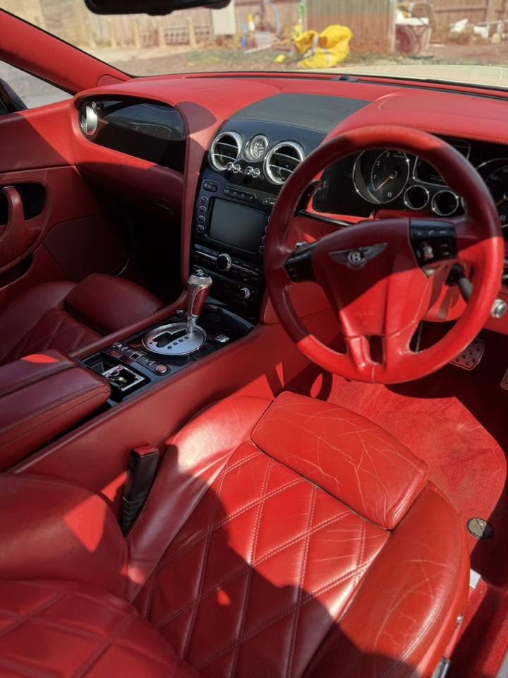 Red leather Bentley Continental interior after a full valet